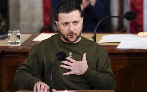 FILE - Ukrainian President Volodymyr Zelenskyy addresses a joint meeting of Congress on Capitol Hill in Washington, Dec. 21, 2022. Ukraine hosted an international defense industry conference as part of a government effort to ramp up weapons production within the country to repel Russia's full-scale invasion and reduce foreign dependence on arms deliveries. (AP Photo/Carolyn Kaster, File)