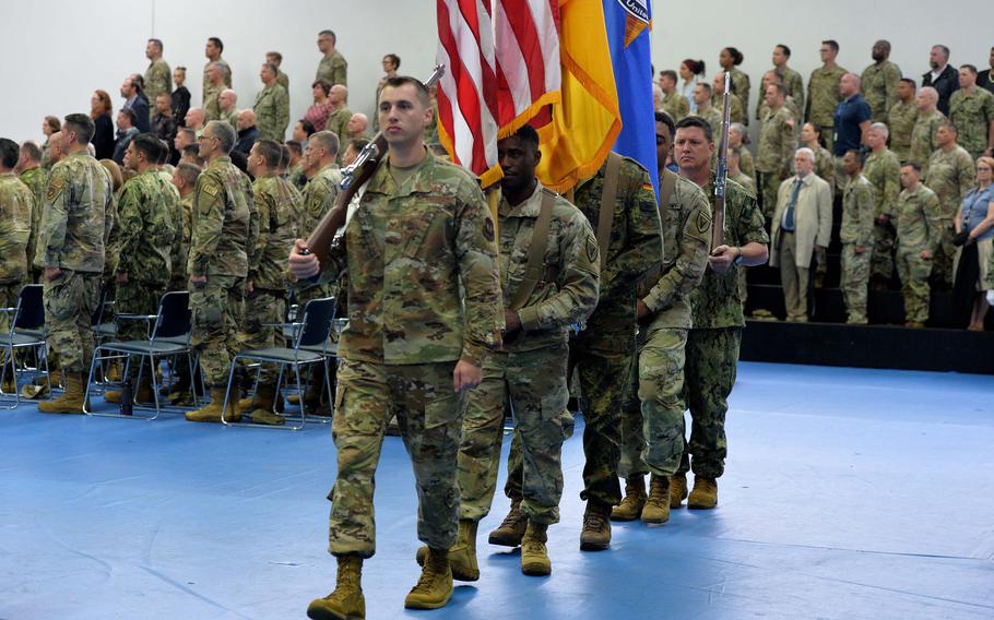 The U.S. European Command color guard marches at the change of command ceremony, July 1, 2022 in Stuttgart, Germany, that saw Gen. Christopher Cavoli take the reins of EUCOM from Gen. Tod Wolters.