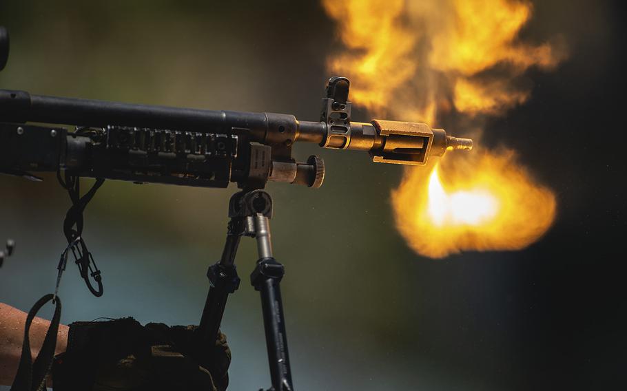 A machine gun is fired during a Special Operations Forces capabilities demonstration in Tampa, Fla., on May 18, 2022. U.S. Special Forces killed Bilal al-Sudani, a senior Islamic State operative, in a Somali cave complex on Jan. 25, 2023.