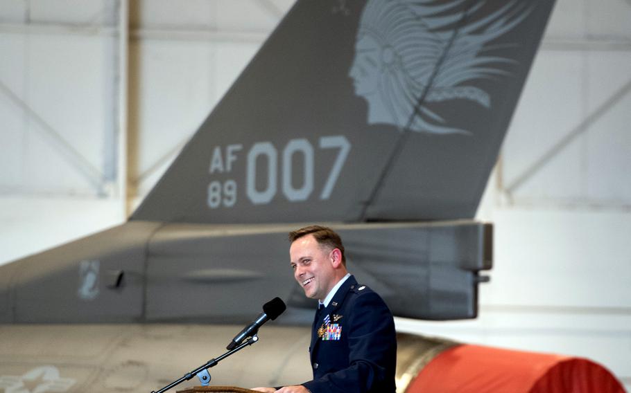 Lt. Col. Michael Coloney speaks at a ceremony at the Tulsa Air National Guard Base, Okla., on Dec. 5, 2021. The actions Coloney took on April 30, 2018, in Afghanistan earned him the Distinguished Flying Cross.