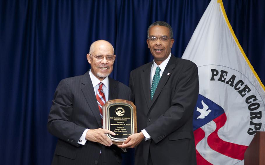 James Joseph, left, receives the 2010 Franklin H. Williams Directors Award on Sep. 9, 2010. Joseph, a former civil rights activist who served as U.S. ambassador to South Africa while the country’s first Black leader, Nelson Mandela, sought Western help in rebuilding a battered economy and battling the AIDS crisis, died Feb. 17 at a hospital in Sarasota, Fla. He was 87.