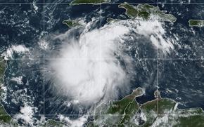 This satellite image provided by the National Oceanic and Atmospheric Administration shows Tropical Storm Ian over the central Caribbean on Saturday, Sept. 24, 2022.  (NOAA via AP)