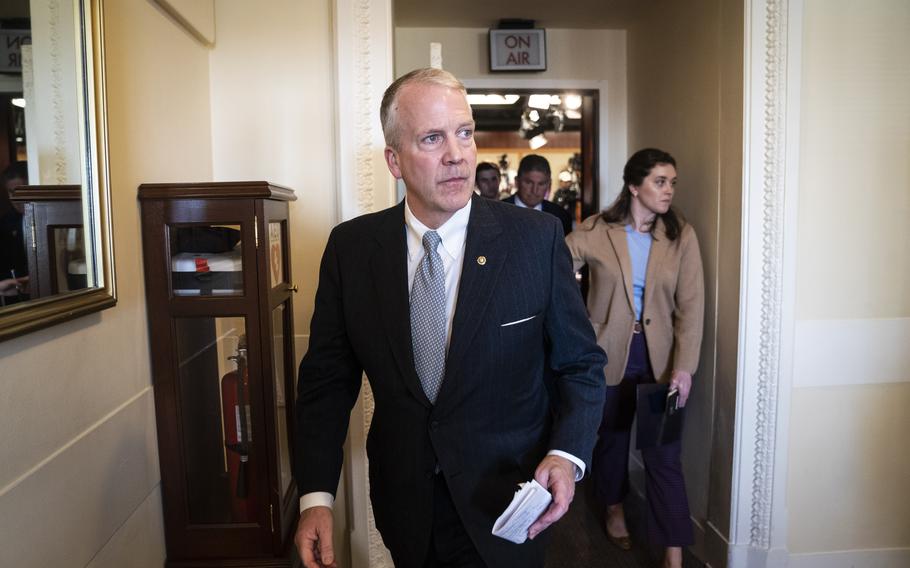 Sen. Dan Sullivan, R-Alaska, departs a news conference on Capitol Hill.