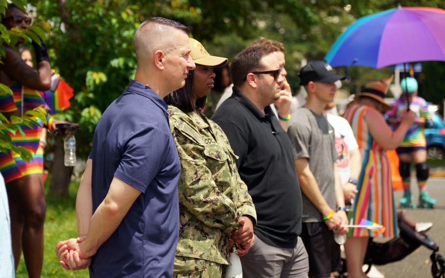Base commander Capt. Les Sobol and others listen to Pride Day speakers following a parade at Yokusuka Naval Base, Japan, Wednesday, June 28, 2023. 