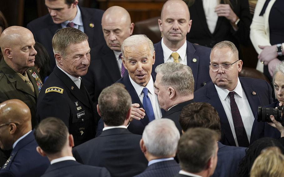 President Joe Biden stops to talk before departing the House Chambers after delivering his State of the Union address during a joint meeting of Congress at the U.S. Capitol on Tuesday, Feb. 7, 2023, in Washington, D.C. 