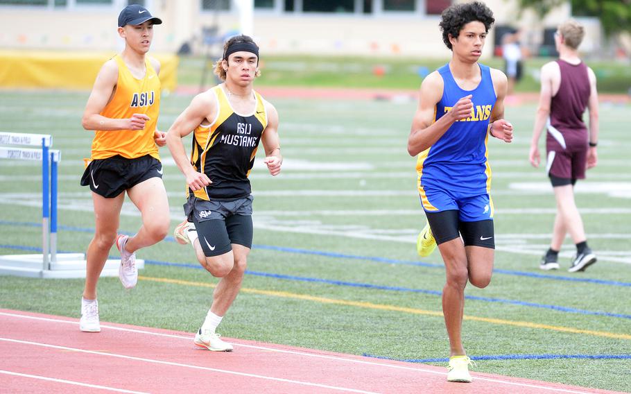St. Mary's William Beardsley leads a pair of American School In Japan runners en route to breaking the Far East meet and northwest Pacific record in the 1,600.