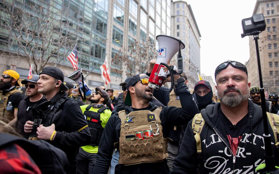Proud Boys leader Henry “Enrique” Tarrio with Proud Boys during a rally for President Donald Trump in Washington, D.C., Dec. 12, 2020. 