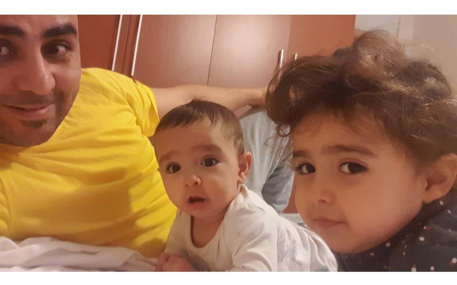 Miraqa Popal and his children Rana, 2, and Ozair, 7 months, have been in Albania since August. They do not know when they will find a permanent home. 