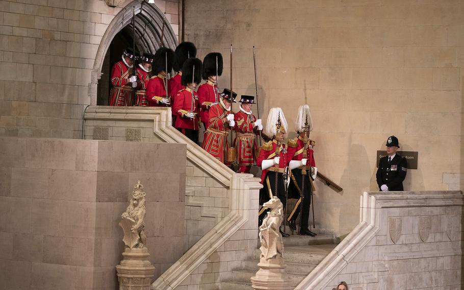 The changing of the guard in Westminster Hall. 
