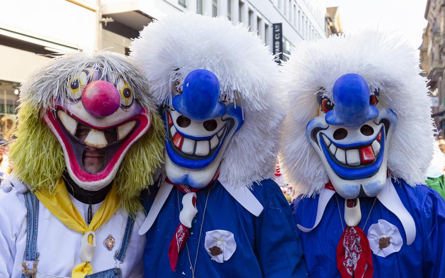 Costumed entertainers take to the streets during Fasnacht in Basel, Switzerland, in 2022.