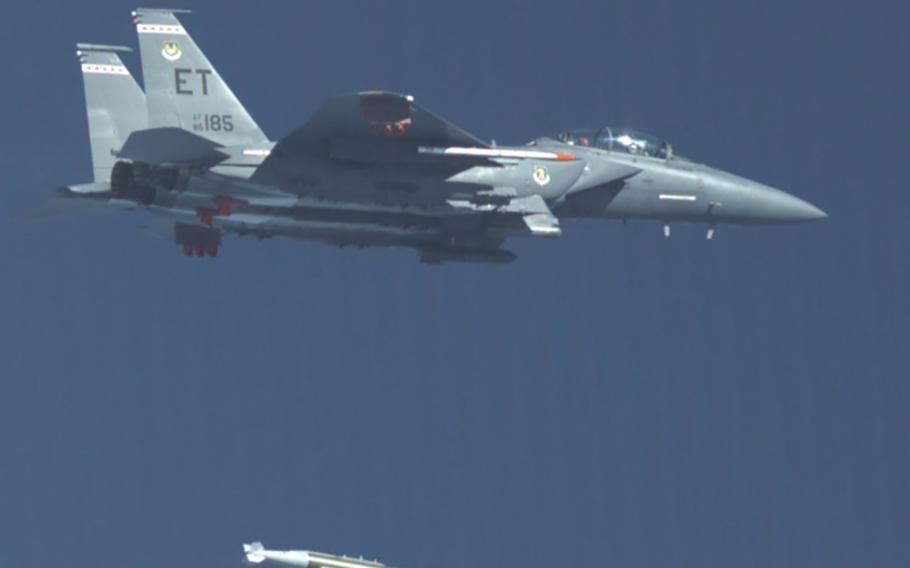 An F-15E Strike Eagle from the 40th Flight Test Squadron drops a GBU-72 Advanced 5K Penetrator bomb over the range at Eglin Air Force Base, Fla., Oct. 7, 2021. 