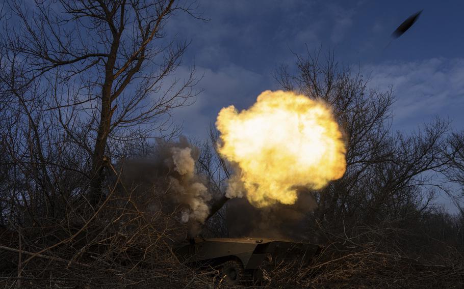 A Ukrainian self-propelled howitzer fires toward Russian forces at the front line near Bakhmut, Ukraine, March 10, 2023. 
