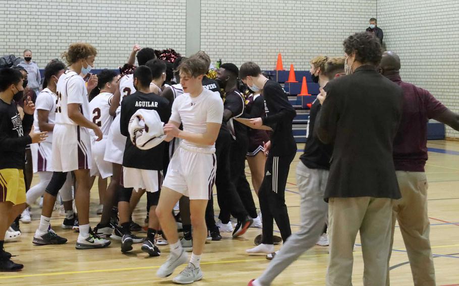 Vilseck’s boys basketball team celebrates a 63-62 victory over Stuttgart on Friday, Jan. 7, 2022, at Vilseck, Germany.