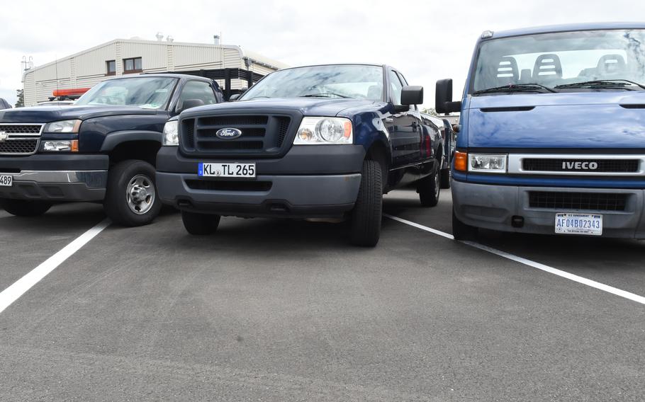 Government vehicles at Ramstein Air Base, Germany, on May 20, 2021, are parked in rows rather than in the diagonal parking places to make more room after the base lost funding for vehicle maintenance. Air Force bases were notified earlier this year that funding would be cut for the remainder of the fiscal year. 