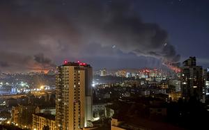 Smoke rises after a Russian strike on Kyiv, Ukraine, Friday, July 4, 2025. (AP Photo/Yehor Konovalov)