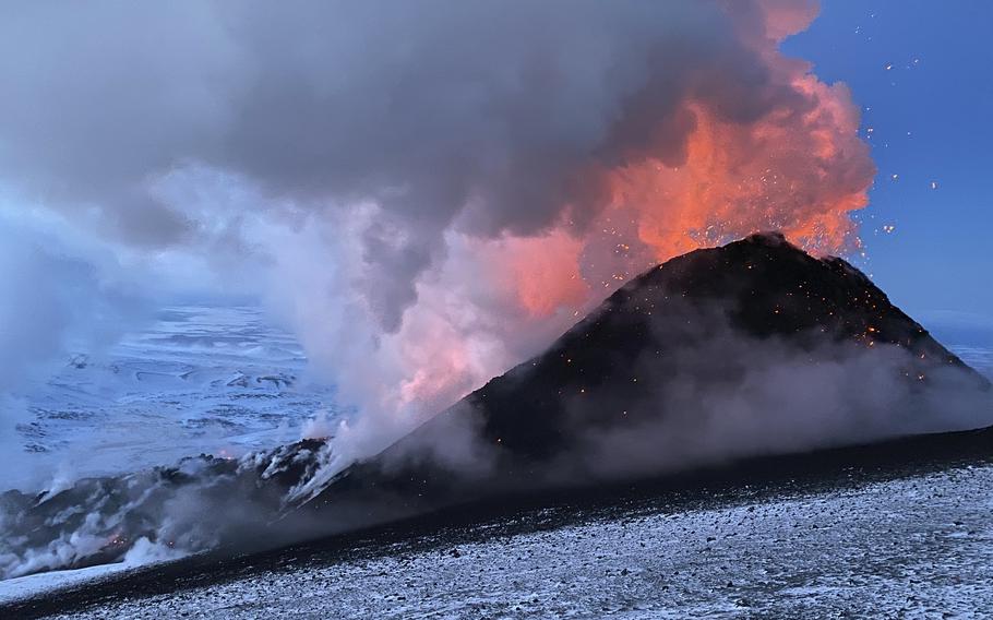 Flames and smoke billowing during the Klyuchevskaya volcano’s eruption on the Kamchatka Peninsula in Russia, on March 8, 2021. Towering clouds of ash and glowing lava are spewing from two volcanoes on the Kamchatka Peninsula and scientists say major eruptions could be on the way. The sudden new activity followed a strong earthquake on Saturday, Nov. 19, 2022, news reports said.