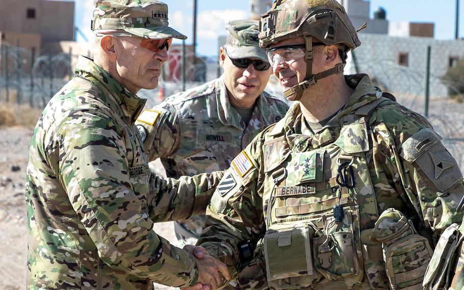 Gen. Randy George, left, vice chief of staff of the Army, and Lt. Gen. Sean Bernabe greet each other Nov. 3, 2022, at Fort Irwin, Calif. George was nominated last week by President Joe Biden to take the Army’s top officer post. If confirmed by the Senate, he would succeed Gen. James McConville.