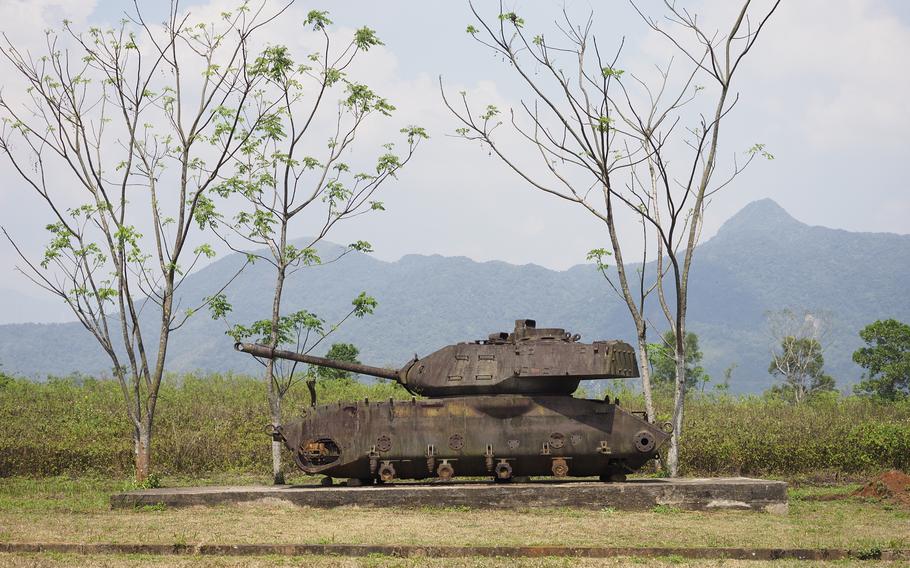 The wreckage of an American tank on display at the Khe Sanh Combat Base in Vietnam.