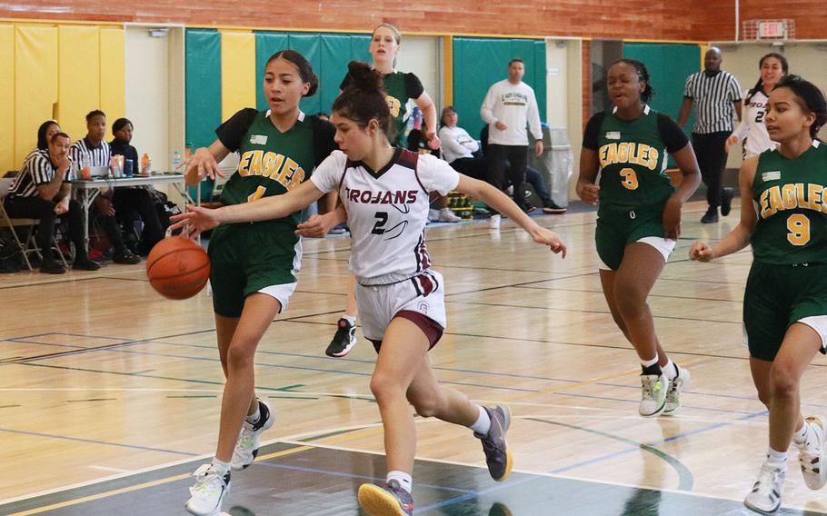 Zama's Isabella Rivera Munoz swipes the ball from Robert D. Edgren's Amya Ross.