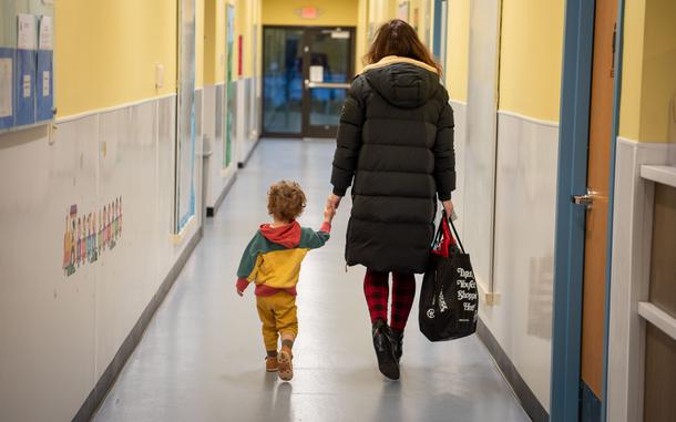 A parent escorts her son  to his classroom at the Lakehurst Child Development Center on  Joint Base McGuire-Dix-Lakehurst, N.J., March 18, 2024. The center reopened for care after 10 months of renovations. (U.S. Air Force photo by

Jewaun Victor)