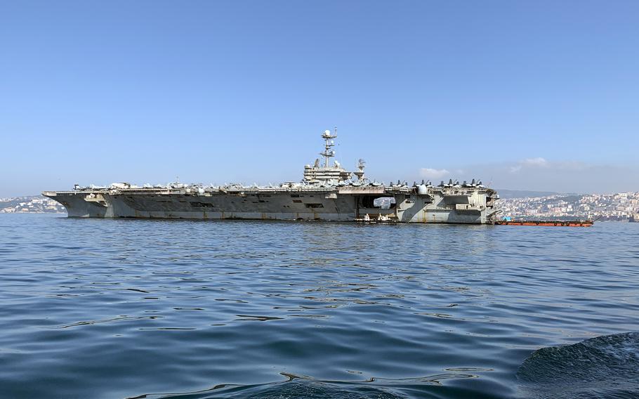 The aircraft carrier USS Harry S. Truman moors in port in Naples, Italy, on May 11, 2022. The ship arrived the day before to the city, where sailors will get a shore break.