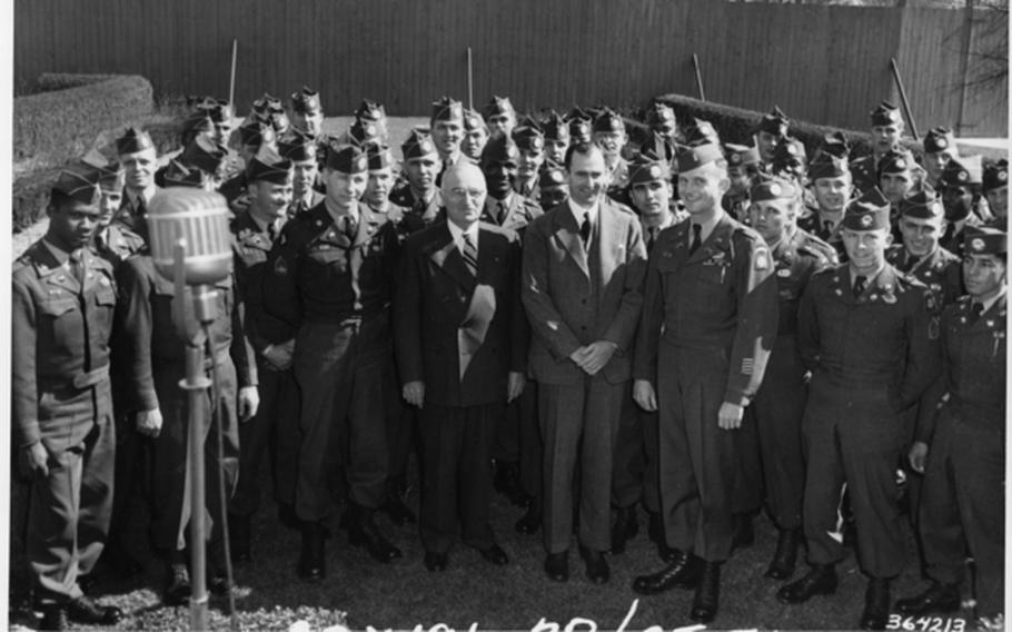 President Harry S. Truman (front row, fifth from right) and Secretary of the Army Frank Pace (front row, fourth from right) with members of the integrated 82nd Airborne in the Rose Garden behind the White House in February, 1951. 