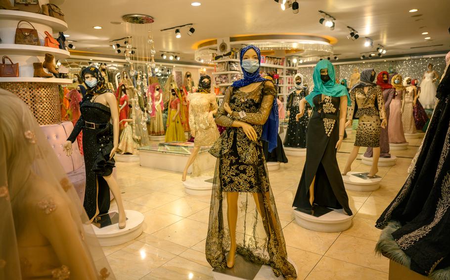 Under Taliban orders, the faces of mannequins in women’s dress shops are to remain covered.