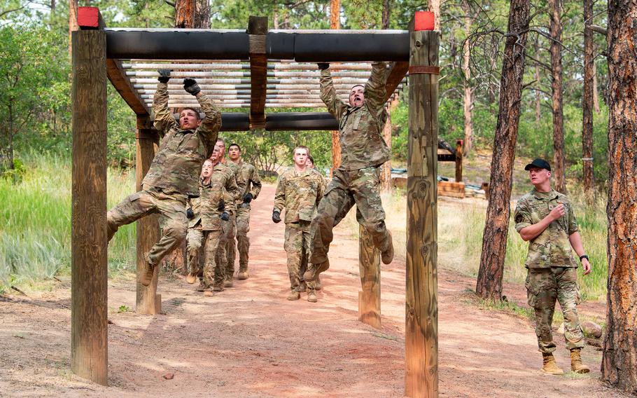 Cadets climb monkey bars