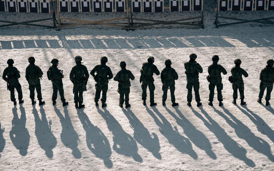 Finnish soldiers at a shooting range during a military exercise at the Santahamina military base in Helsinki, Finland on March 7, 2023. 