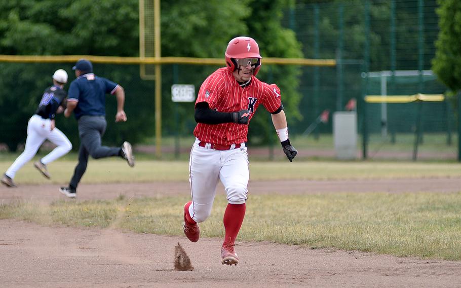 Kaiserslautern senior Logan Bell runs to third base following a hit during the Division I final against Ramstein at the 2025 DODEA European baseball championships on May 23, 2025, at Southside Fitness Center on Ramstein Air Base, Germany.