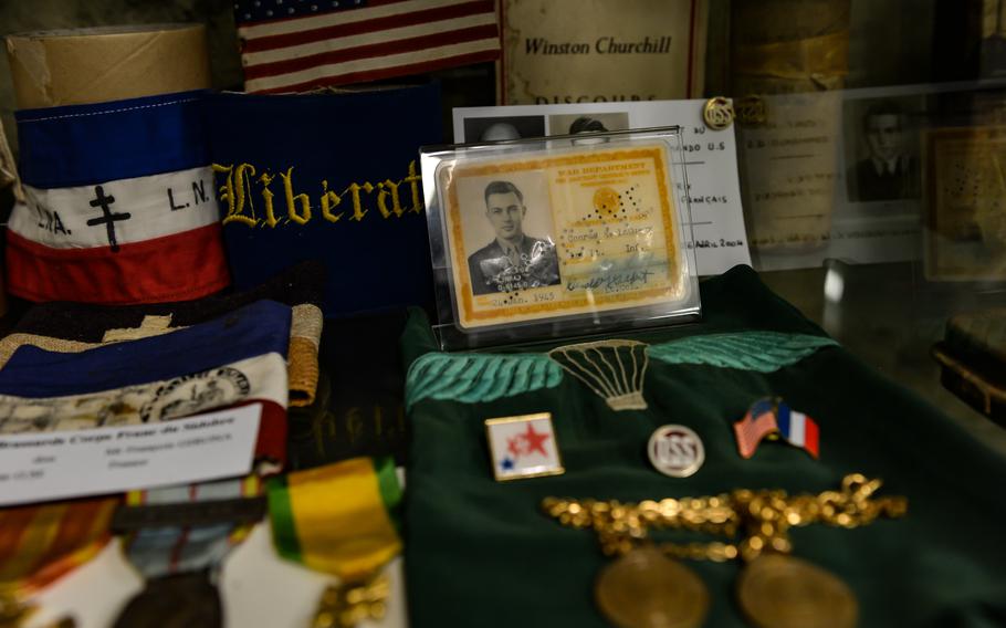 A War Department identification card for then-1st Lt. Conrad LaGueux is on display at Le Militarial museum in Boissezon, France, May 27, 2022. LaGueux led a team of Office of Strategic Services parachute team to fight alongside French resistance fighters during World War II. 