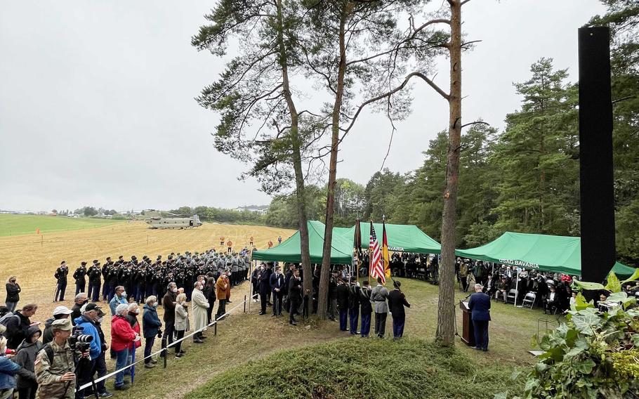 Attendees gather around the Pegnitz memorial site, Aug. 18, 2021, during the 50th anniversary ceremony for the helicopter crash that claimed the lives of 37 U.S. soldiers near Pegnitz, Germany.