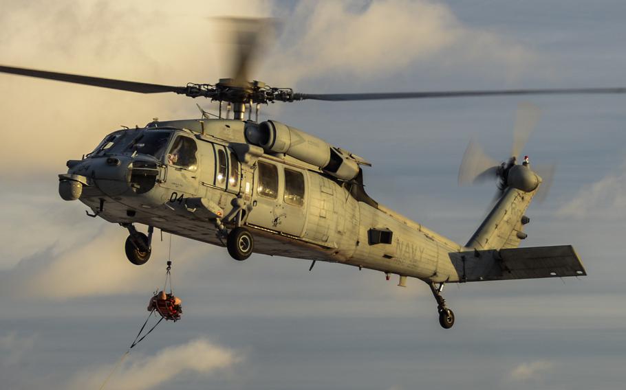 An MH-60S Seahawk assigned to Helicopter Sea Combat Squadron 25 conducts search-and-rescue training at Andersen Air Force Base, Guam, June 15, 2016.