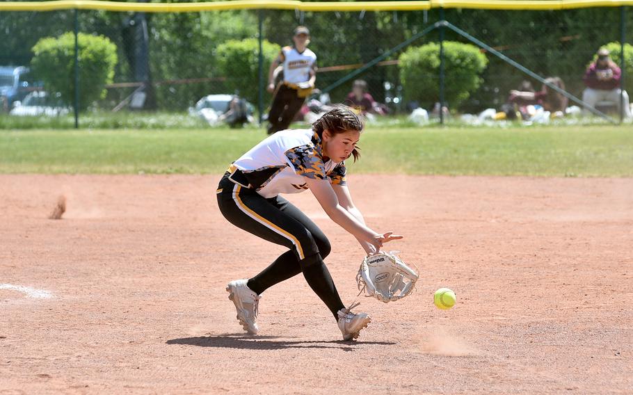 Stuttgart pitcher Shannon Correa fields a grounder during a Division I DODEA European softball quarterfinal with Wiesbaden on May 19, 2023, on Ramstein Air Base, Germany.