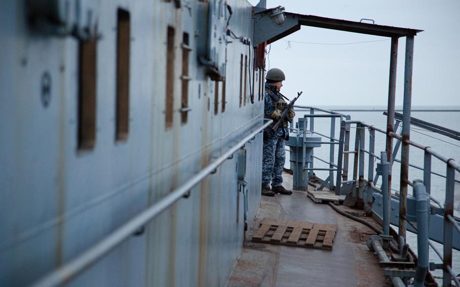 A Ukrainian navy sailor at his post on the command ship Donbas off Mariupol, Ukraine, on Dec. 15. 