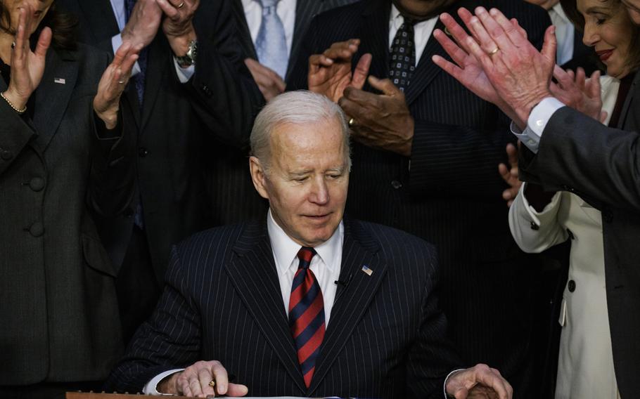 President Biden signs H.R. 2471, the “Consolidated Appropriations Act, 2022,” in the Indian Treaty Room of the White House in Washington, D.C., on March 15, 2022.