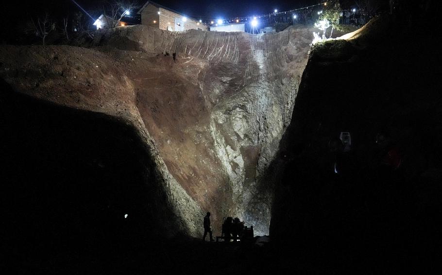 Civil defense workers and local authorities attempt to rescue a 5-year-old boy who fell into a hole in the northern village of Ighran in Morocco’s Chefchaouen province, Friday, Feb. 4, 2022. On Saturday, authorities announced that the boy’s dead body was recovered.