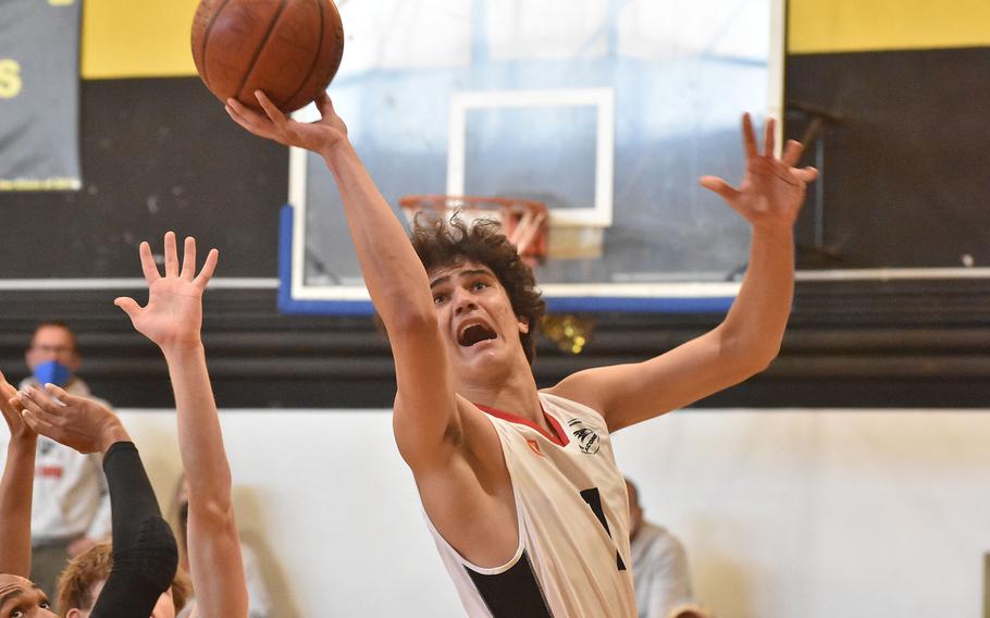 American Overseas School of Rome's Renato Boccanelli tries to score Thursday, March 3, 2022, at the DODEA-Europe Division II basketball championships at Vicenza, Italy.