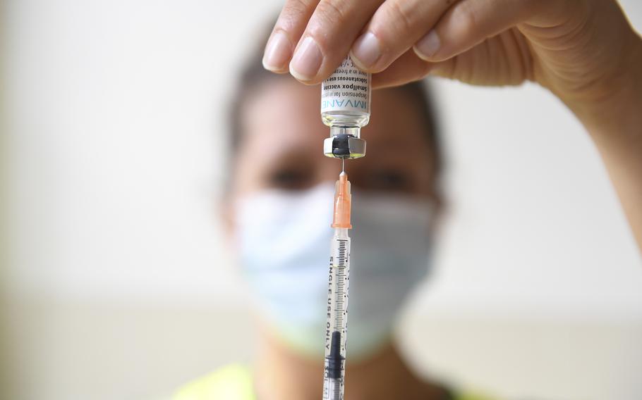 A health professional prepares a dose of a Monkeypox vaccine at the Edison municipal vaccination center in Paris July 27, 2022.  