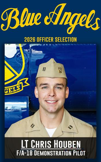 A service member smiles for a photo