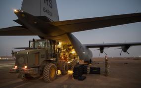 Tech. Sgt. Jacob Kozlowski prepares to download cargo from a U.S. Air Force C-130J Super Hercules at Air Base 101, in Niger in February 2023. Russian forces are now operating inside the base, but they pose little risk to American personnel there, Defense Secretary Lloyd Austin said this week.  