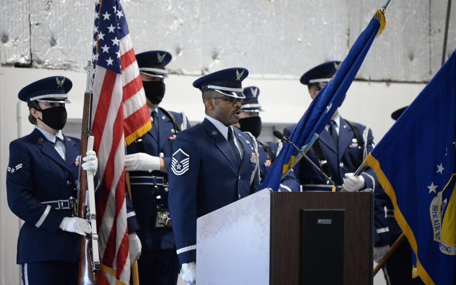 U.S. Air Force Master Sgt. Joshua Lane, Honor Guard noncommissioned officer in charge, 88th Force Support Squadron, sings the National Anthem during the graduation ceremony of 28 new Ceremonial Guardsmen at Wright-Patterson Air Force Base, Ohio, April 20, 2021.