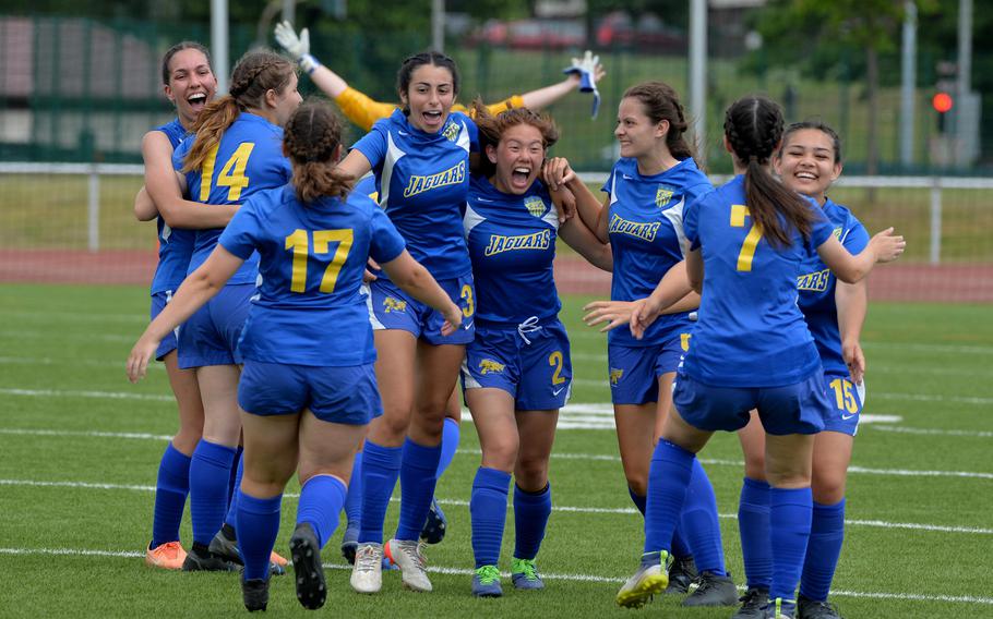 The Sigonella Jaguars celebrate their 3-1 win over AFNORTH in the girls Division III final at the DODEA-Europe soccer championships in Kaiserslautern, Germany, Thursday, May 19, 2022. 