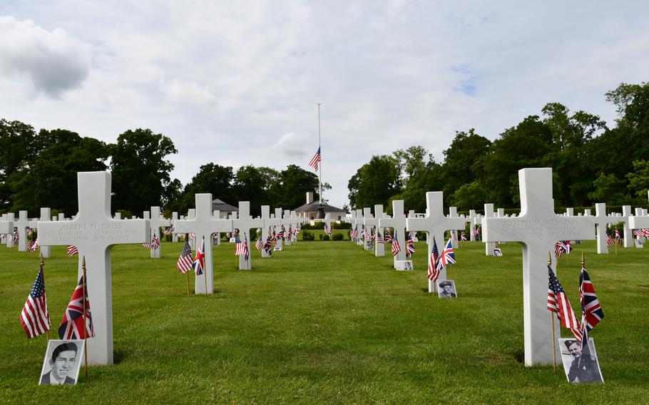 The American flag is flown at half mast at the Cambridge American Cemetery on Memorial Day, Monday, May 30, 2022.