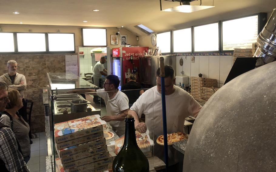 There's a lot of action at Pizza and Pasta Da Angelo in Frankfurt, near where the U.S. Army’s Drake and Edwards kasernes once were. At the family-run pizzeria, customers order at the counter, pick up their food and, if staying at the restaurant to eat, return their plates afterward. At right is the Valoriani stone pizza oven.