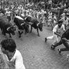 Stars and Stripes
Pamplona, Spain, July, 1989: Revelers attempt to outrace the bulls during the traditional display of bravado on the first day of the San Fermin festival at Pamplona. 