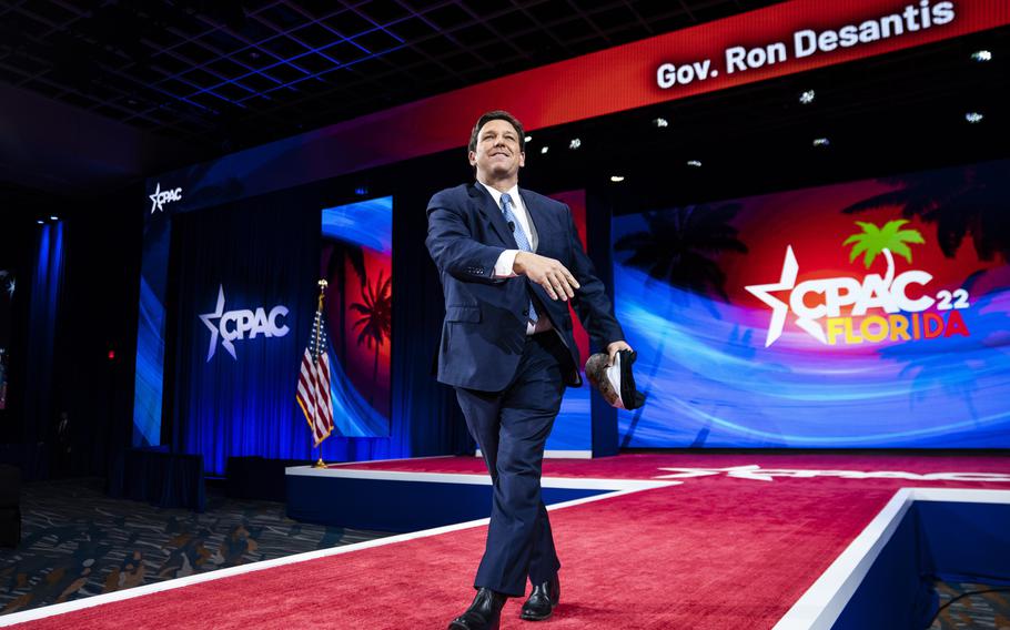 Florida Gov. Ron DeSantis takes the stage Thursday, Feb. 24, 2022, in Orlando. DeSantis’ turn on CPAC’s center stage is the latest indication that he may be laying the groundwork for a possible presidential run in 2024. 