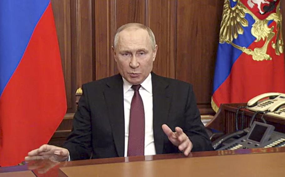 In this image made from video released by the Russian Presidential Press Service, Russian President Vladimir Putin addressees the nation in Moscow, Russia, Thursday, Feb. 24, 2022. 