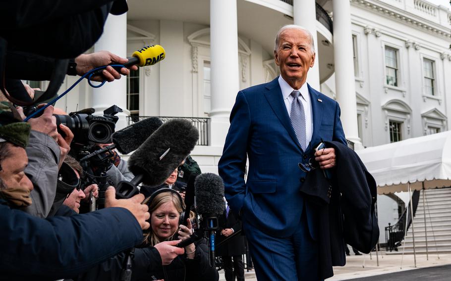 President Biden speaks with the media before boarding Marine One outside the White House on Thursday.