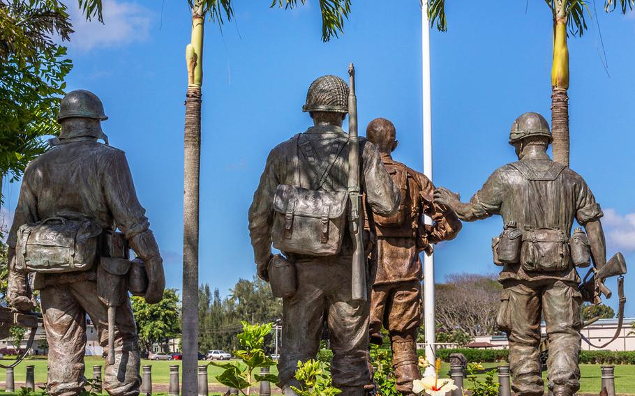 Statues with a flag pole outside Schofield Barracks of the U.S. Army's 25th Infantry Division in Oahu, Hawaii. 
